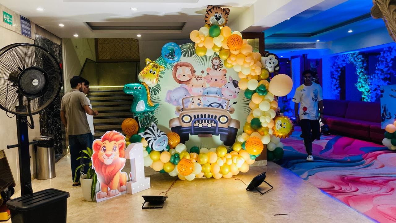 Birthday celebration balloon arch in lobby