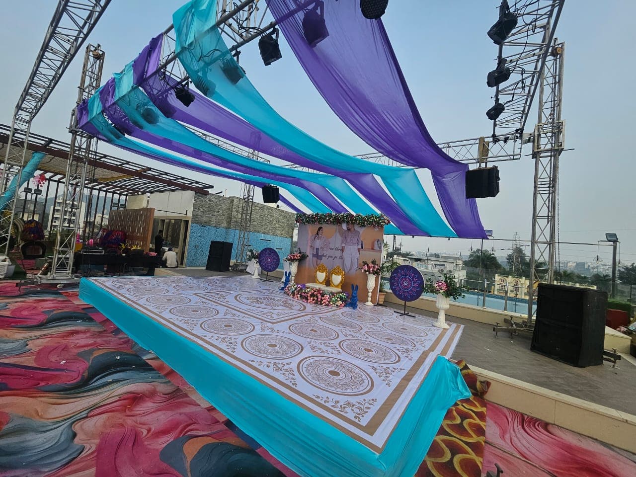 Rooftop stage with dramatic draping
